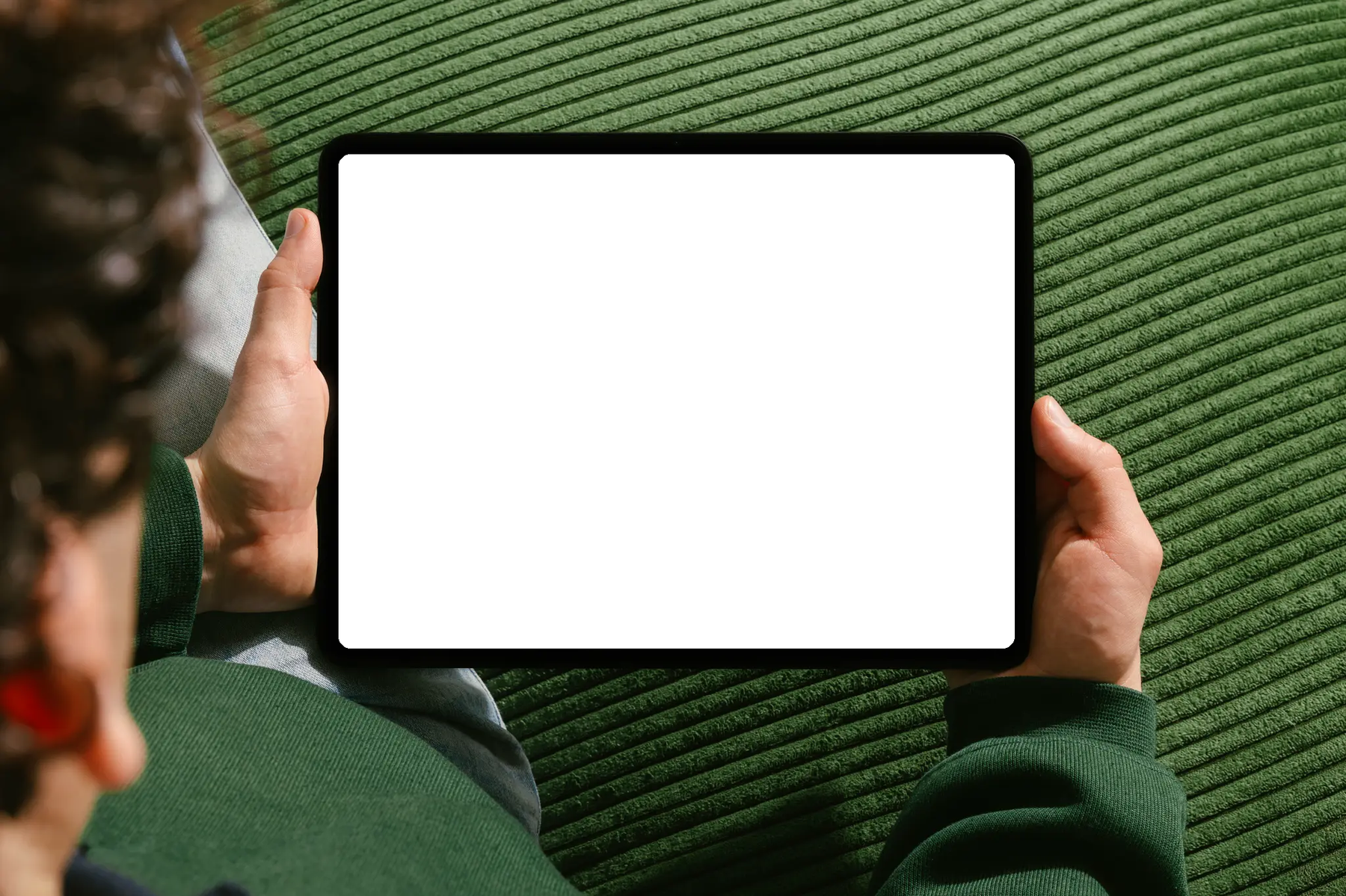 Two hands holding a tablet. The screen shows two small charts side by side: a smooth rising curve labelled what we wish growth looked like, and a jagged stepped line labelled reality.